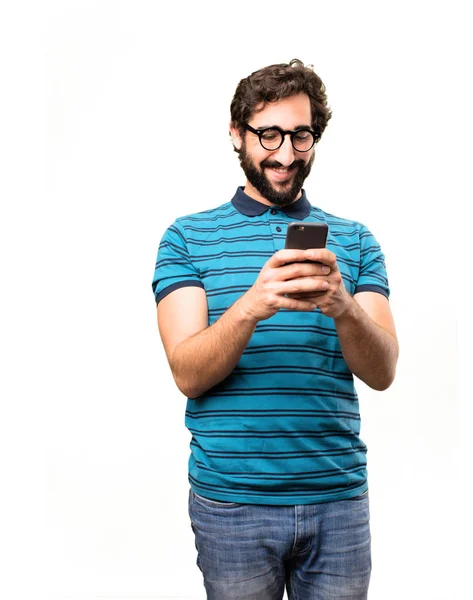 Nuori viileä mies älypuhelimen kanssa — kuvapankkivalokuva
