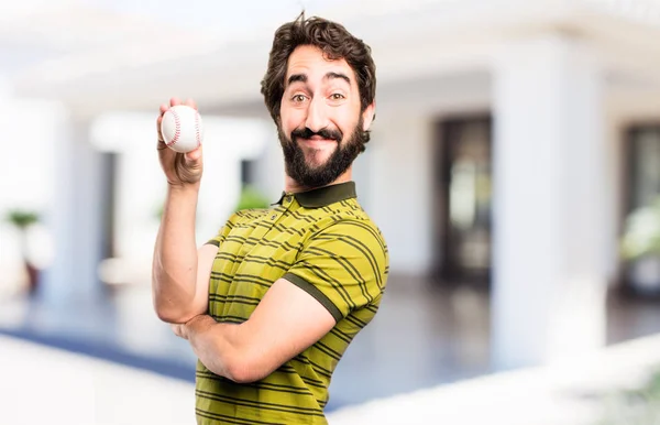 Joven fresco hombre con una pelota de béisbol —  Fotos de Stock