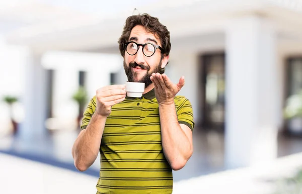 Joven fresco hombre con un café —  Fotos de Stock