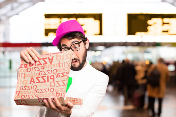 Joven empresario loco con una pizza — Foto de Stock