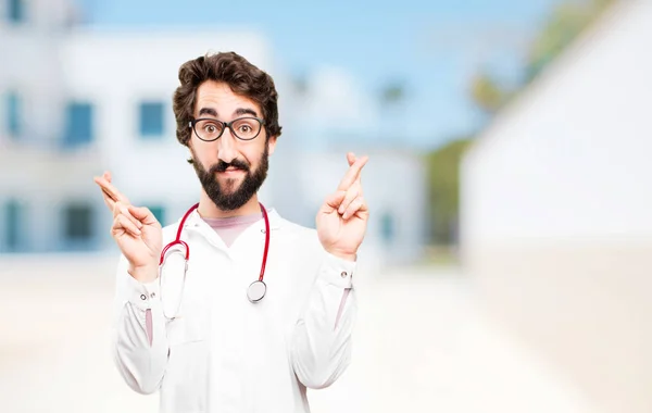 Médico homem com dedo cruz sinal — Fotografia de Stock
