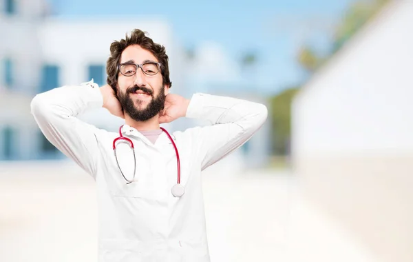 Junger Arzt mit glücklichem Gesichtsausdruck — Stockfoto