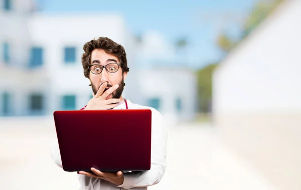 Young doctor man with a laptop — Stock Photo, Image