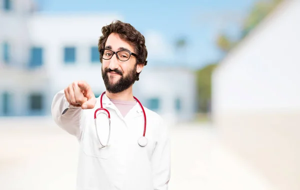 young doctor man pointing