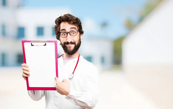 Young doctor man with a report — Stock Photo, Image