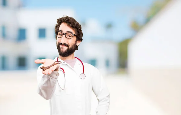 young doctor man with old key