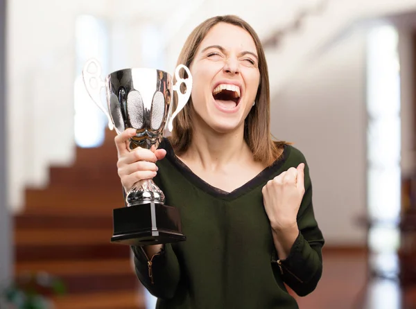 Young pretty woman with trophy — Stock Photo, Image