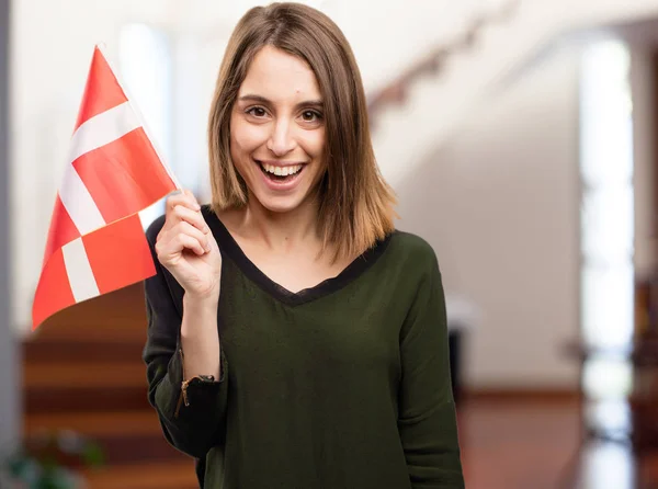 Young pretty woman with a flag — Stock Photo, Image