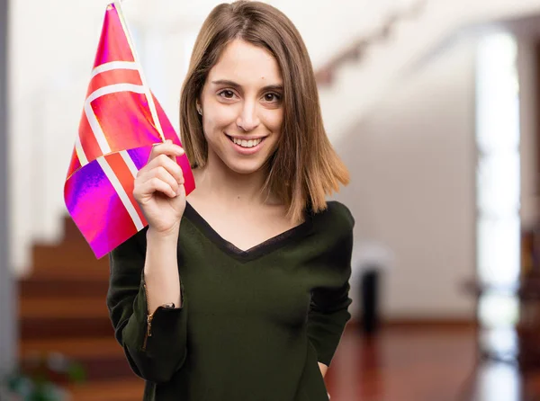 Mooie jongedame met een vlag — Stockfoto