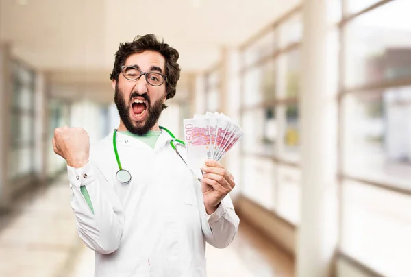 young doctor man with euro bills