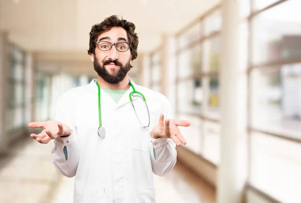 young doctor man with confused expression