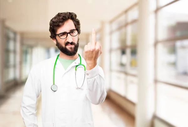 young doctor man with disagreement expression