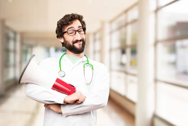 Молодой врач с мегафоном — стоковое фото