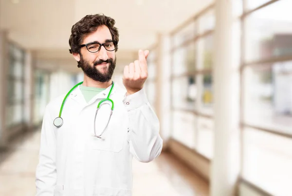 young doctor man with money sign