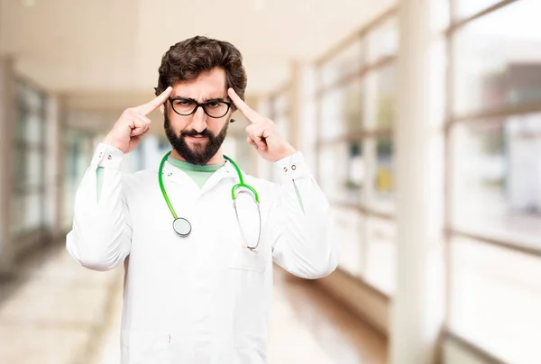 Young doctor man thinking — Stock Photo, Image