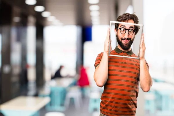 Junger cooler Mann mit Rahmen — Stockfoto