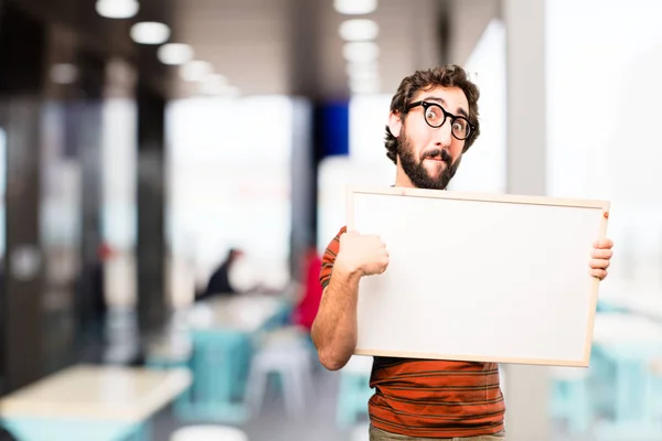 Young cool man with a placard — Stock Photo, Image
