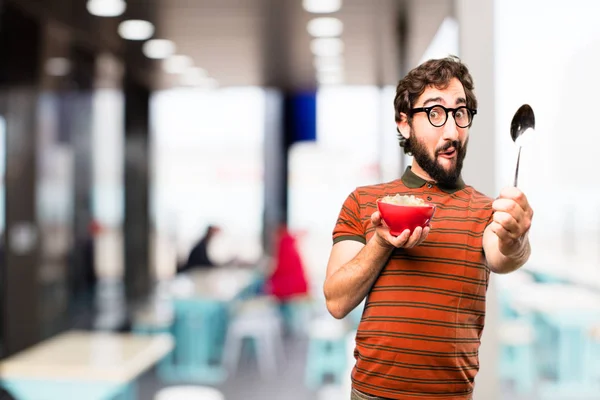 Joven fresco hombre teniendo desayuno —  Fotos de Stock