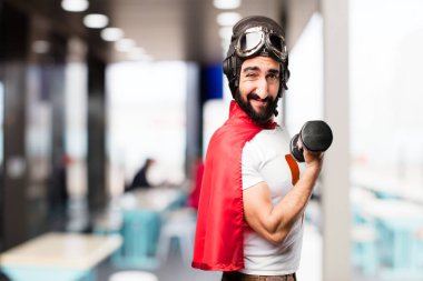 bir dumbbell ile genç süper kahraman