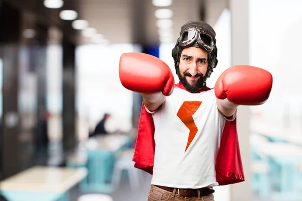 Young super hero with boxing gloves — Stock Photo, Image