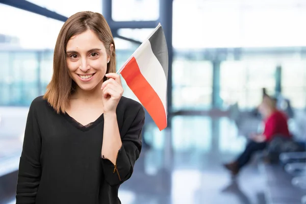 Young pretty woman with a flag — Stock Photo, Image