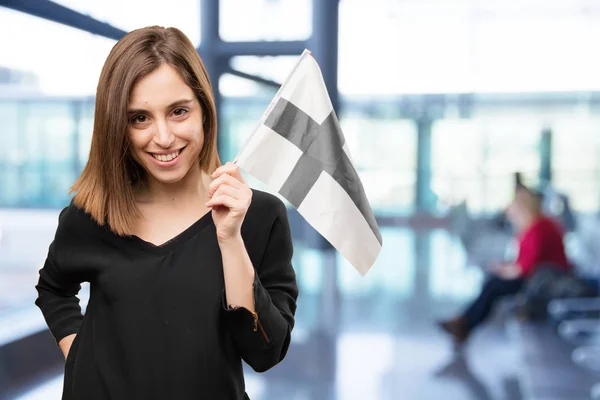 Mooie jongedame met een vlag — Stockfoto