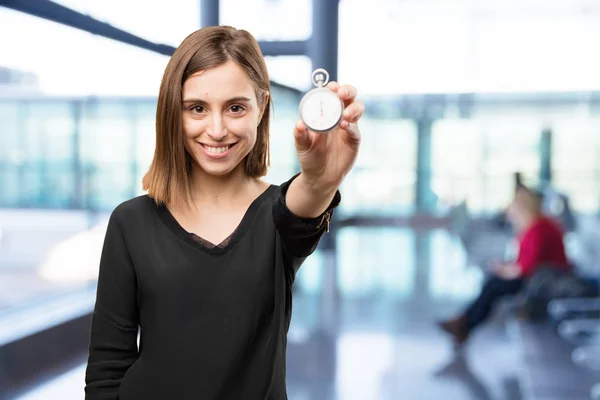 Junge hübsche Frau mit Stoppuhr — Stockfoto