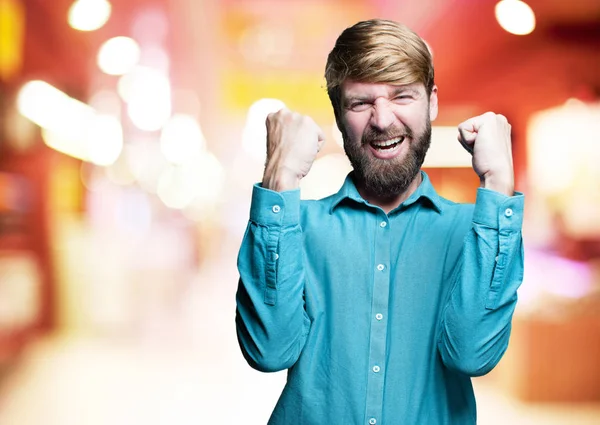 Young blonde man with victory sign — Stock Photo, Image