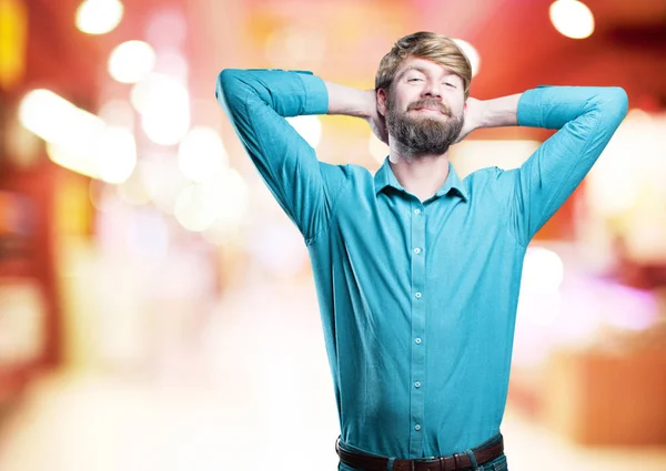 Jovem loira homem em satisfação pose — Fotografia de Stock