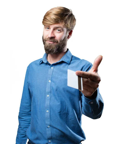 Young blonde man with credit card — Stock Photo, Image