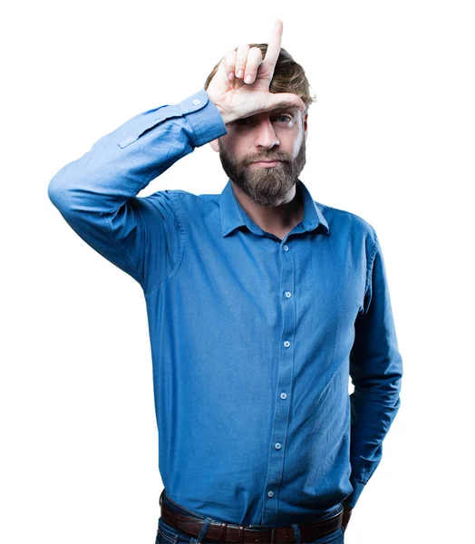 Young blonde man with loser sign — Stock Photo, Image