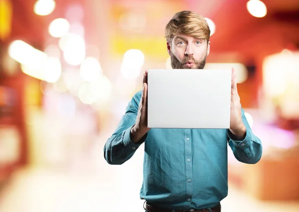 Young blonde man with a placard — Stock Photo, Image