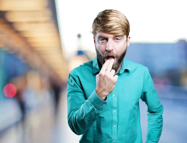 Giovane uomo biondo con segno di voit — Foto Stock