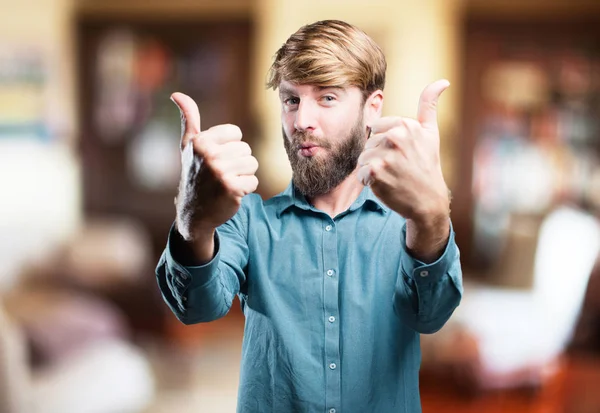 Young blonde man with okay sign — Stock Photo, Image
