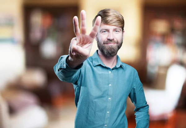 Muž s číslem tři znamení — Stock fotografie