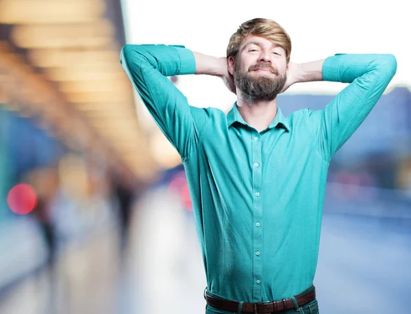 Jovem loira homem em satisfação pose — Fotografia de Stock