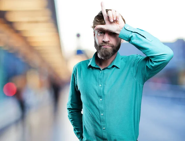 Joven hombre rubio con signo perdedor — Foto de Stock