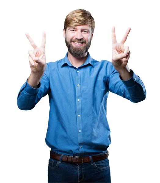 Young blonde man with victory sign — Stock Photo, Image