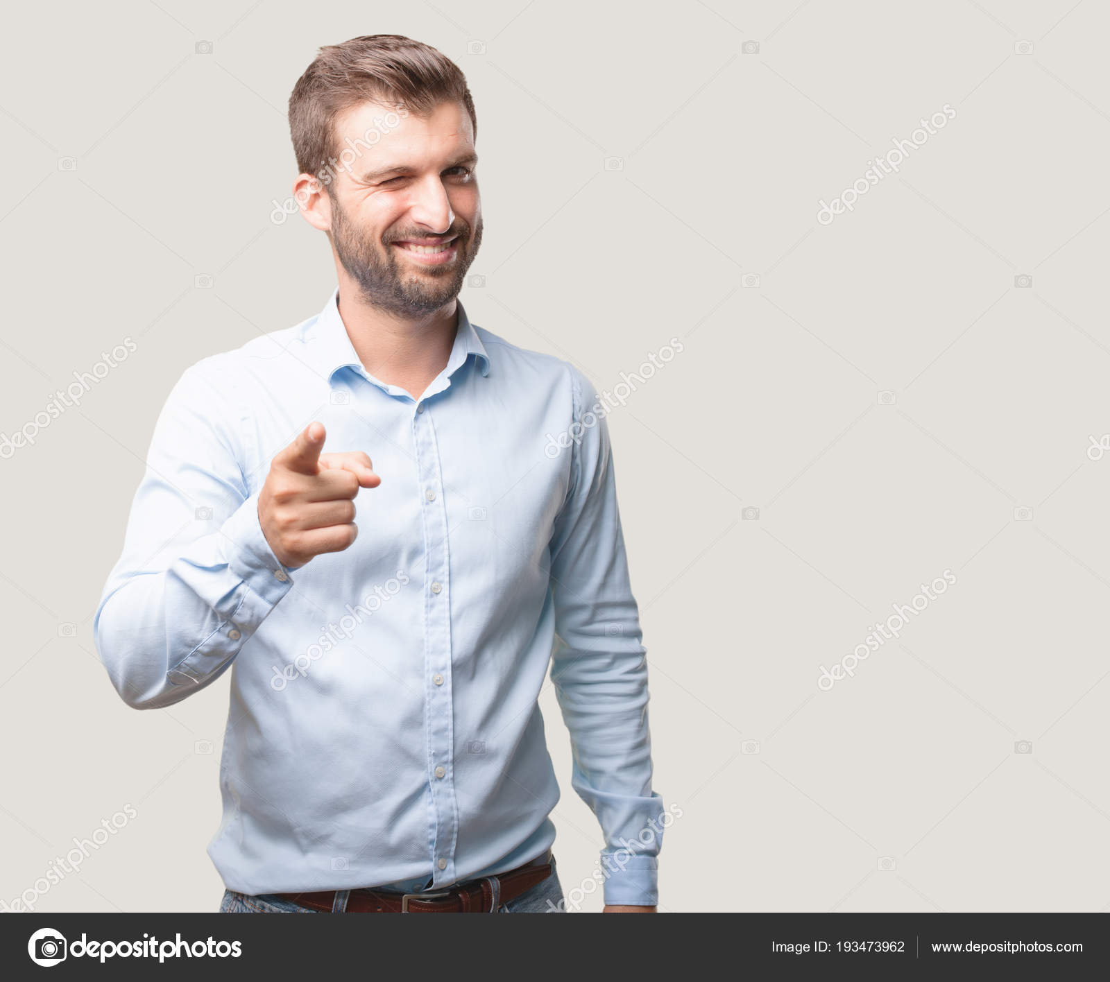 Young Handsome Man Winking Eye Pose Wearing Blue Shirt Person — Stock Photo  © kues #193473962, image size:1600x1416