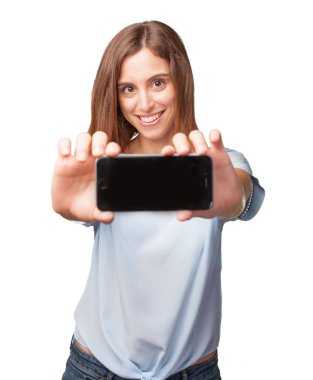 bir akıllı telefon olan güzel kadın