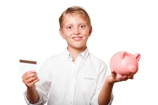 白い背景に 貯金箱を保持している金髪の少年 — ストック写真