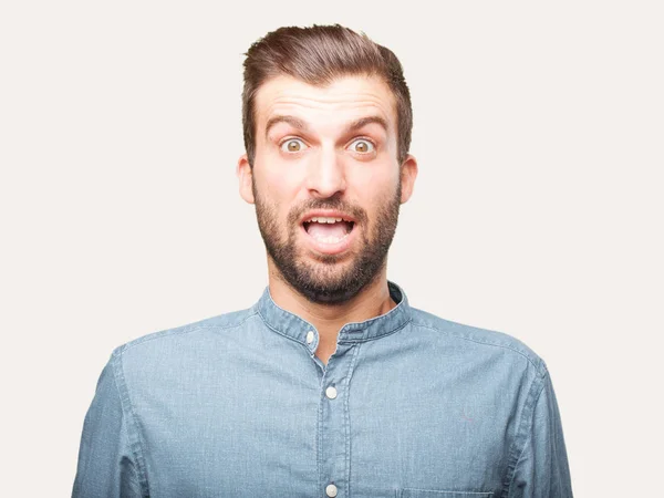 Jonge Knappe Man Verrast Geschokt Expressie Een Blauwe Shirt Dragen — Stockfoto