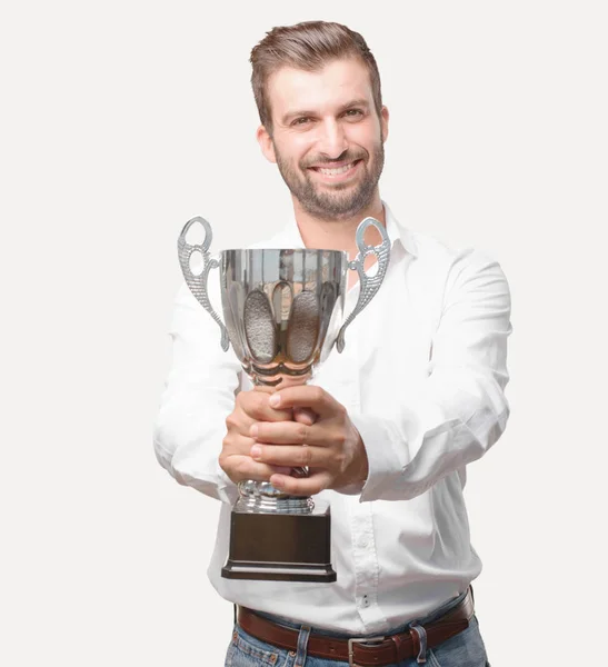 Молодой Красивый Мужчина Трофеем Белой Футболке Выражением Успеха Человек Изолированный — стоковое фото