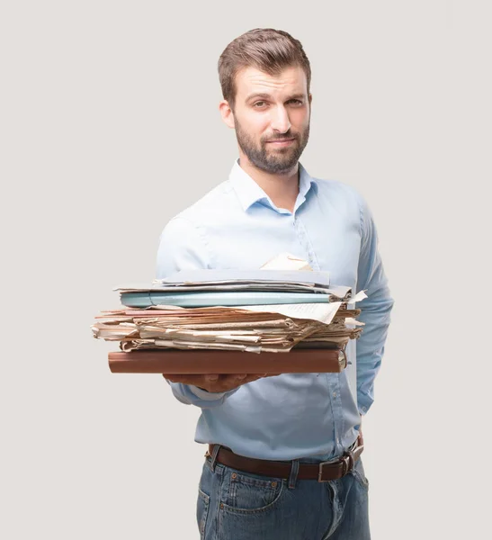 Joven Hombre Guapo Sosteniendo Una Torre Documentos Archivos Con Una — Foto de Stock