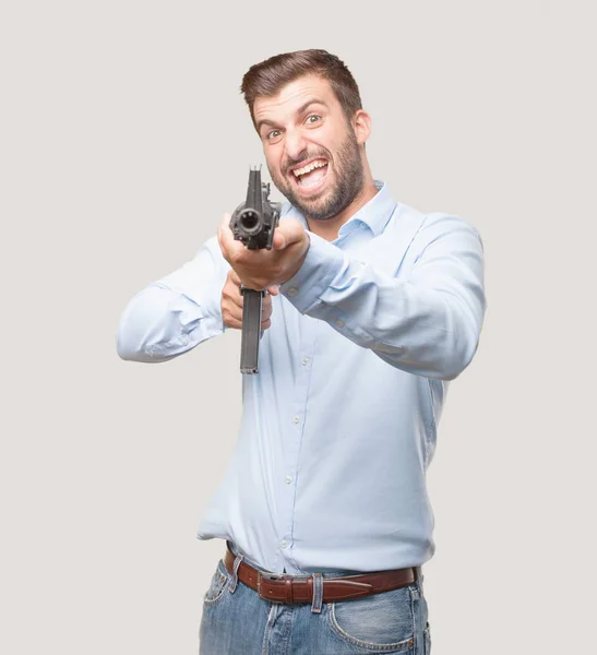 Jeune Homme Beau Expression Colère Tenant Fusil Portant Shirt Bleu — Photo