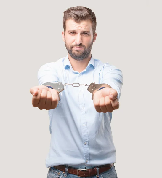 Young Handsome Man Sad Handcuffs Wearing Blue Shirt Person Isolated — Stock Photo, Image