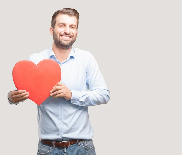Young Handsome Man Holding Heart Symbol Wearing Blue Shirt Person — Stock Photo, Image