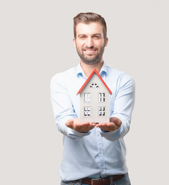 Young Handsome Man Holding House Model Wearing Blue Shirt Person — Stock Photo, Image