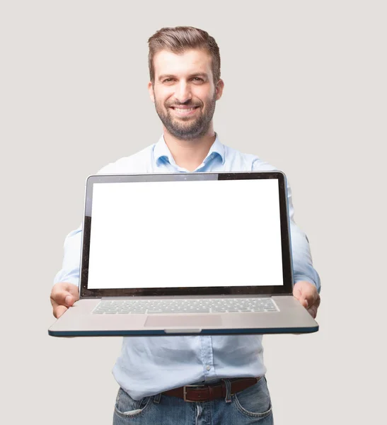 Młody Przystojny Mężczyzna Trzyma Laptopa Pustego Ekranu Miejsce Koncepcji Niebieska — Zdjęcie stockowe