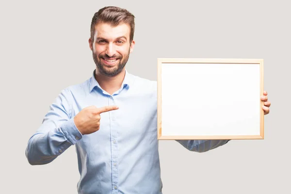 Jonge Knappe Man Met Een Schoolbord Een Blauwe Shirt Dragen — Stockfoto